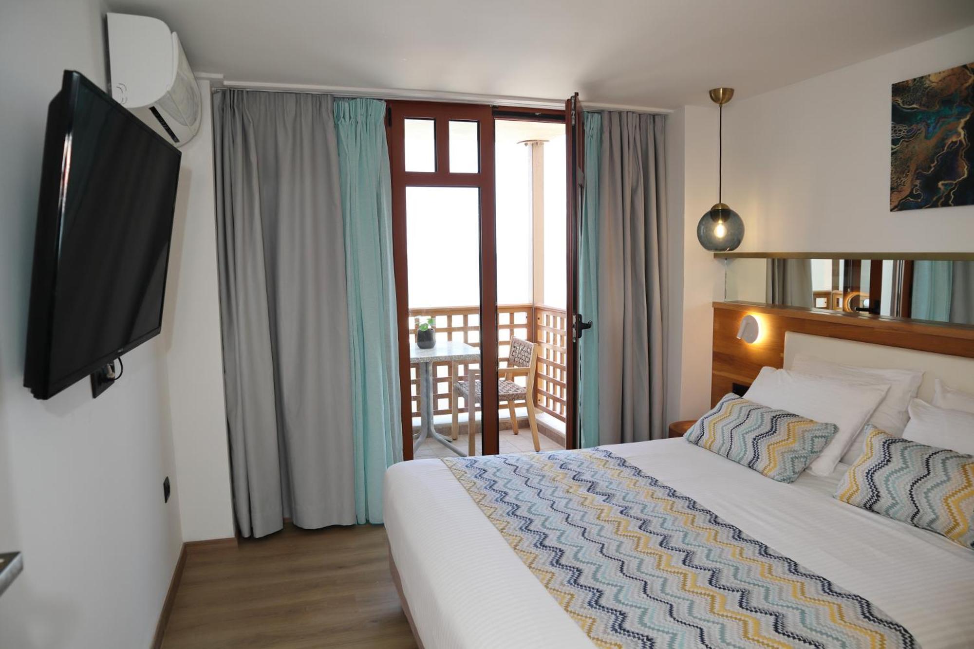 Ammos Suites Ретимно Экстерьер фото