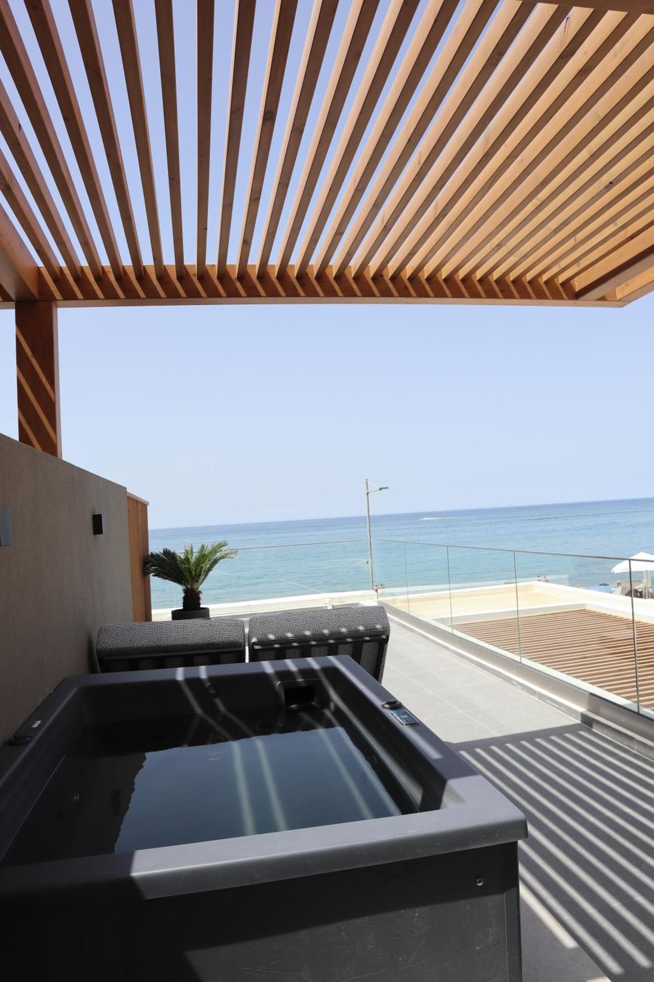 Ammos Suites Ретимно Экстерьер фото